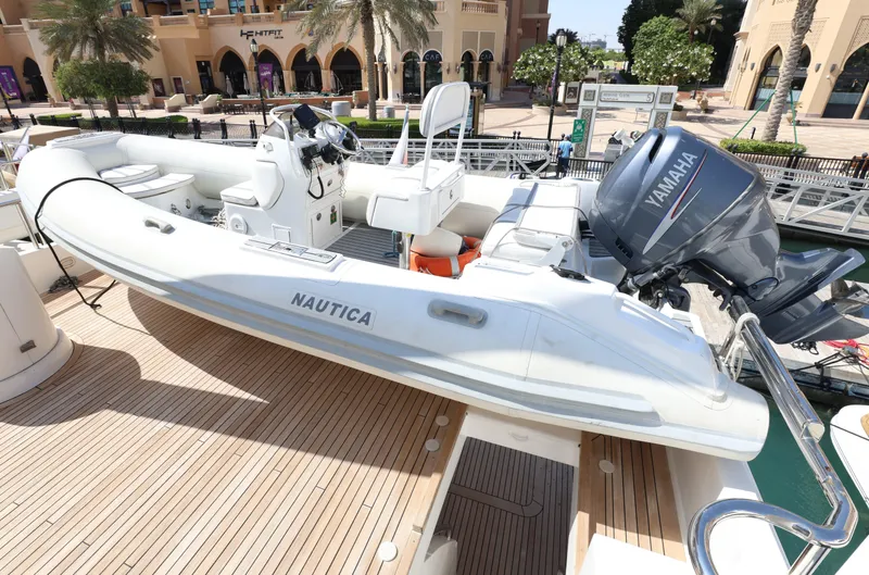  Yacht Photos Pics White Nautica boat with Yamaha engine on Codecasa 105 Custom yacht, 1999 model.