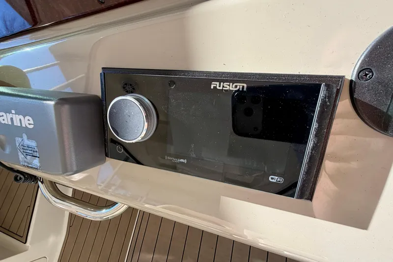  Yacht Photos Pics Fusion audio system on 2014 Sea Ray 370 Sundancer boat dashboard.