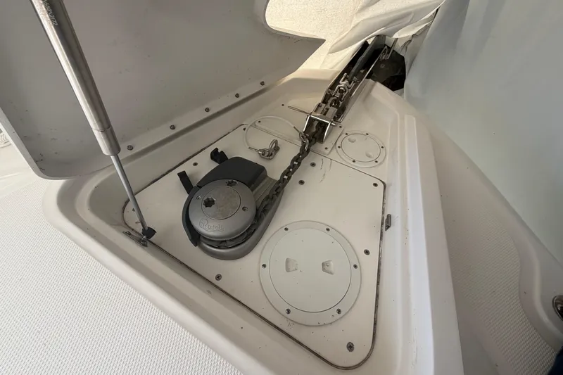  Yacht Photos Pics Anchor compartment of 2014 Sea Ray 370 Sundancer with windlass and chain.