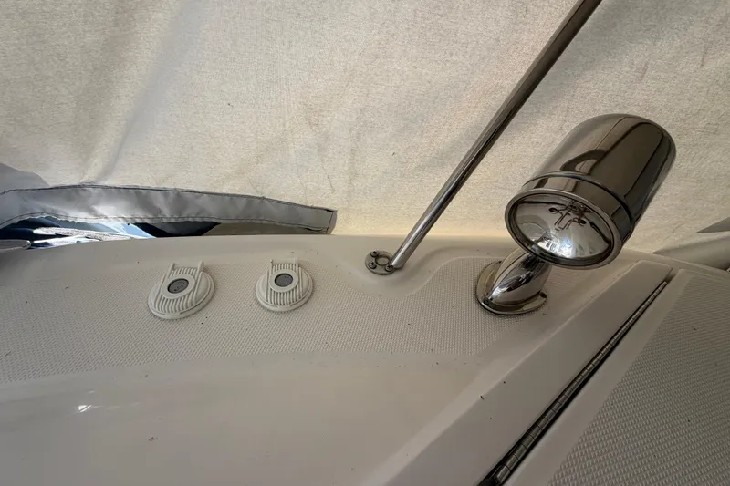  Yacht Photos Pics 2014 Sea Ray 370 Sundancer deck with chrome light fixture and fittings.