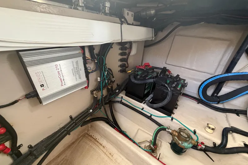  Yacht Photos Pics Engine compartment of a 2014 Sea Ray 370 Sundancer with batteries and wiring.