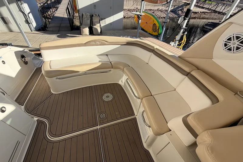  Yacht Photos Pics Luxurious seating area on a 2014 Sea Ray 370 Sundancer boat with teak flooring.