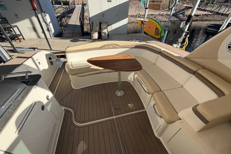 Yacht Photos Pics Luxurious 2014 Sea Ray 370 Sundancer yacht interior with elegant seating and wooden table.