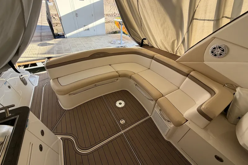  Yacht Photos Pics Luxurious seating area on 2014 Sea Ray 370 Sundancer yacht with elegant wood flooring.