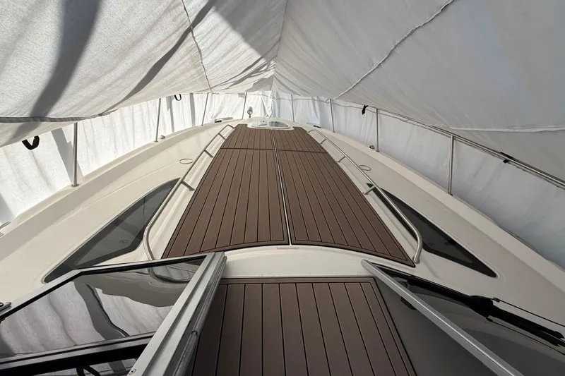  Yacht Photos Pics 2014 Sea Ray 370 Sundancer boat deck under protective cover.