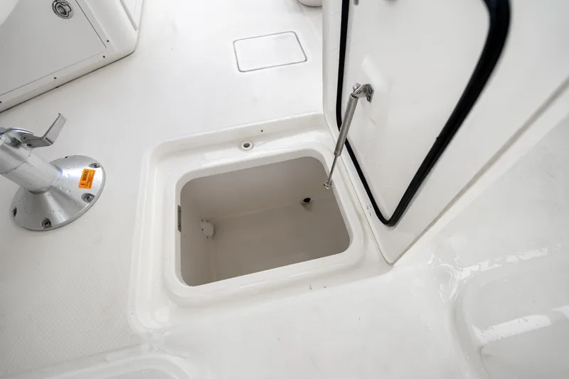  Yacht Photos Pics Open storage compartment on 2018 Boston Whaler 320 Vantage boat deck.