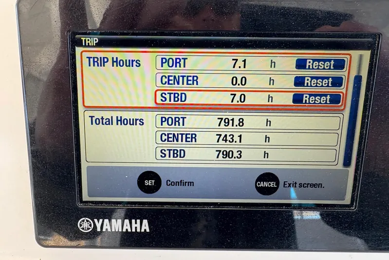 In Absentia Yacht Photos Pics Yamaha engine display showing trip and total hours for Everglades 350LX, 2017 model.