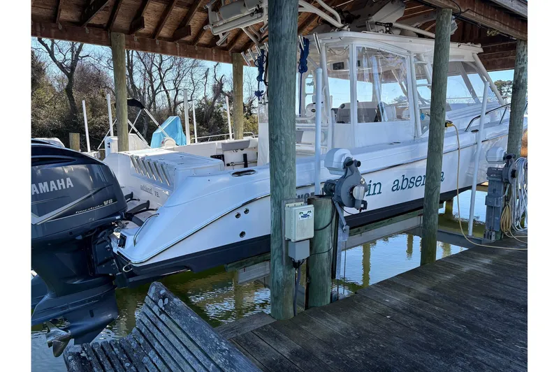 In Absentia Yacht Photos Pics 2017 Everglades 350LX boat docked with Yamaha V8 engine.
