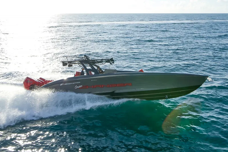  Yacht Photos Pics 2021 Midnight Express 43' Solstice speedboat cruising on open ocean waters.