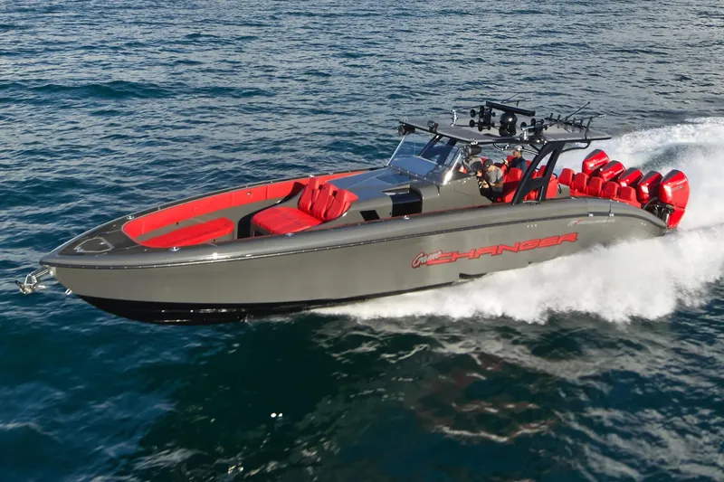  Yacht Photos Pics 2021 Midnight Express 43' Solstice boat cruising on open water, featuring sleek design and red accents.