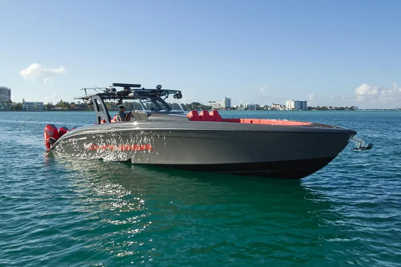  Yacht Photos Pics 2021 Midnight Express 43' Solstice boat on clear blue water, sunny day.