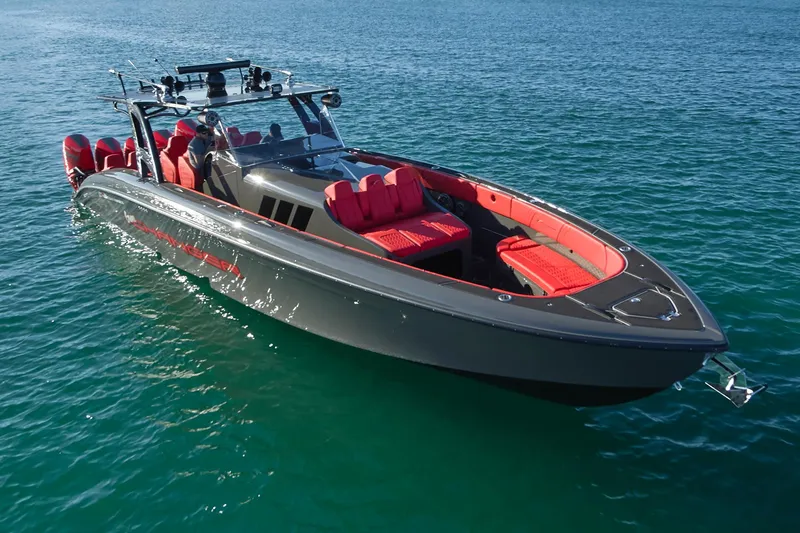  Yacht Photos Pics 2021 Midnight Express 43' Solstice boat with red seating on clear blue water.