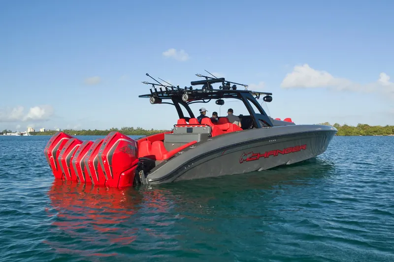  Yacht Photos Pics 2021 Midnight Express 43' Solstice boat with multiple red engines on calm water.