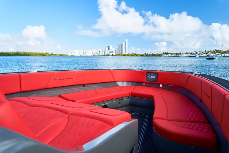  Yacht Photos Pics Luxury 2021 Midnight Express 43' Solstice boat with red seating, ocean view, and city skyline.