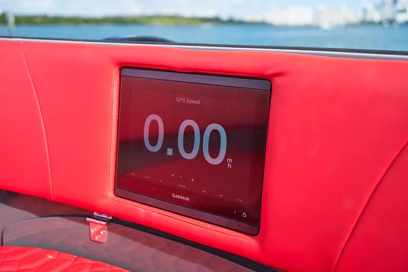  Yacht Photos Pics Red interior of 2021 Midnight Express 43' Solstice with GPS display showing 0.00 mph.