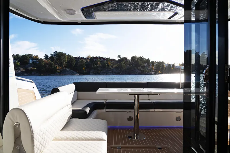  Yacht Photos Pics Luxurious 2024 Galeon 440 Fly yacht interior with scenic water view.