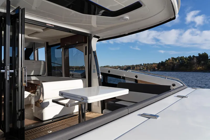  Yacht Photos Pics 2024 Galeon 440 Fly yacht interior with open deck and scenic water view.