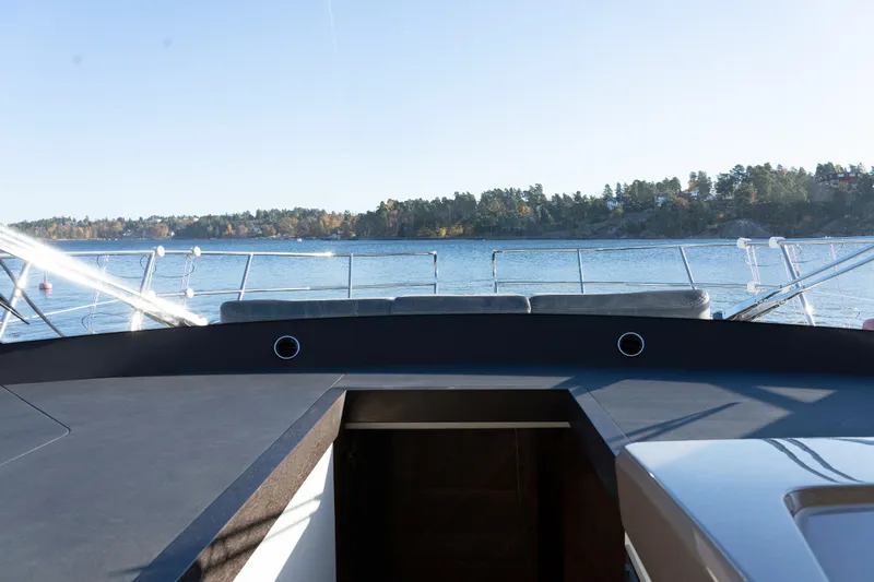  Yacht Photos Pics 2024 Galeon 440 Fly yacht deck with scenic water view.