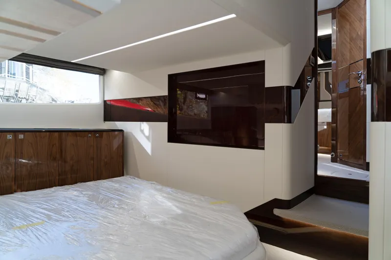  Yacht Photos Pics Luxurious interior of 2024 Galeon 440 Fly yacht with modern design and wood accents.