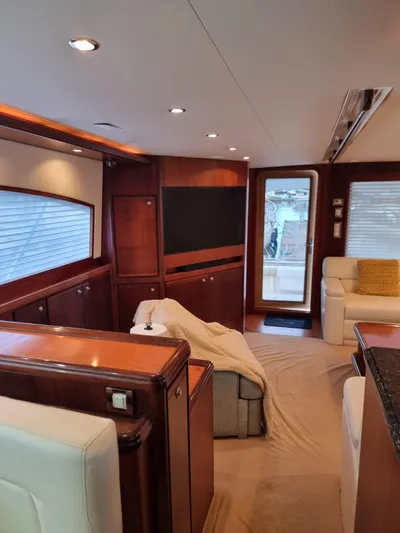  Yacht Photos Pics Luxurious interior of a 2009 Bertram 700 Enclosed yacht with modern furnishings.