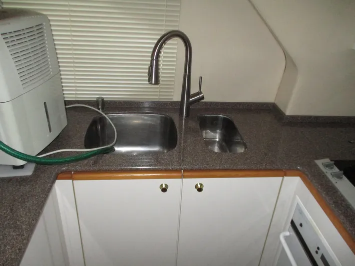 Spice Yacht Photos Pics Kitchen sink area in a 2000 Bayliner 5288 Pilot House yacht.