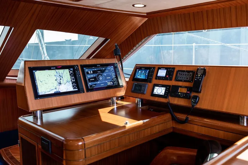 Cabochon Yacht Photos Pics Pilothouse interior of 2004 Ta Chiao Custom Pilothouse Cutter with navigation equipment.