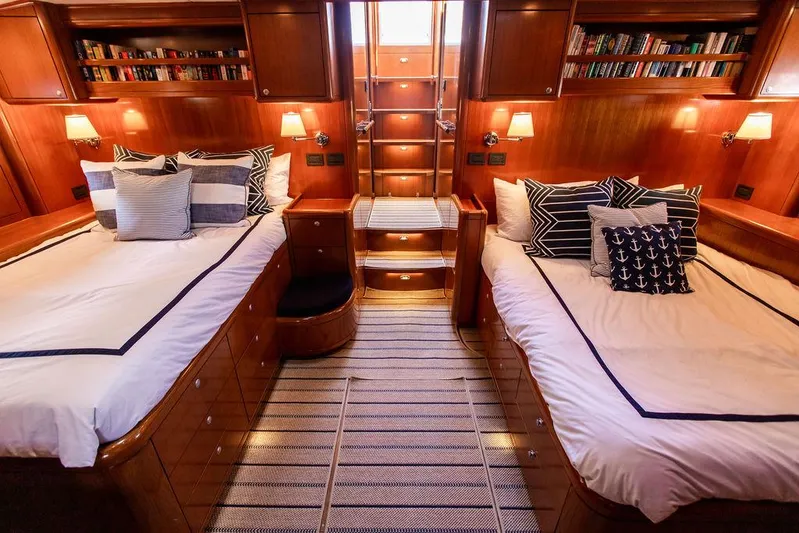 Cabochon Yacht Photos Pics Luxurious 2004 Ta Chiao Custom Pilothouse Cutter cabin with twin beds and elegant wood finish.