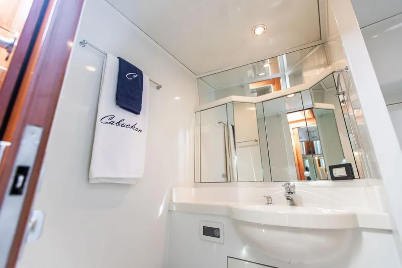 Cabochon Yacht Photos Pics Luxurious bathroom in 2004 Ta Chiao Custom Pilothouse Cutter yacht with modern fixtures.