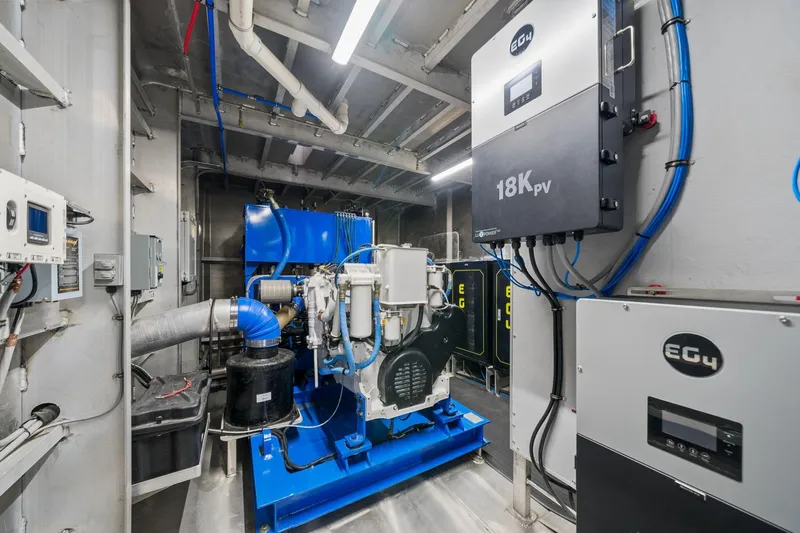 Shine Down Yacht Photos Pics Engine room of Breaux Brothers 120 GLV, 2025 model, featuring advanced machinery and control systems.