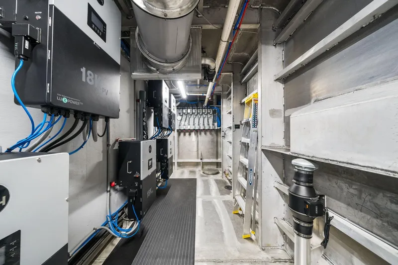 Shine Down Yacht Photos Pics Electrical room of 2025 Breaux Brothers 120 GLV vessel with advanced power systems.