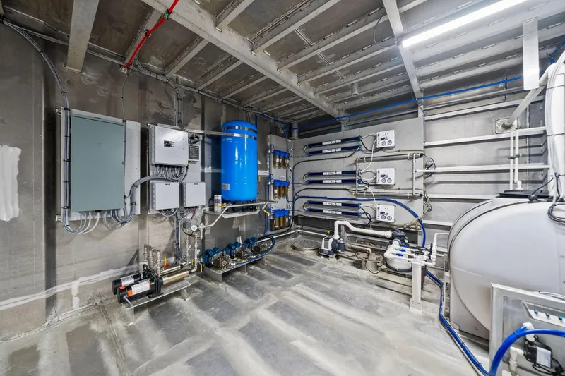 Shine Down Yacht Photos Pics Industrial equipment room with advanced piping and control systems, Breaux Brothers 120 GLV, 2025 model.