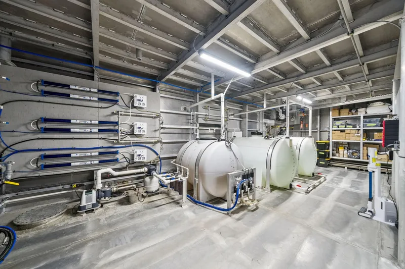 Shine Down Yacht Photos Pics Industrial interior of Breaux Brothers 120 GLV, 2025 model, featuring tanks and piping systems.