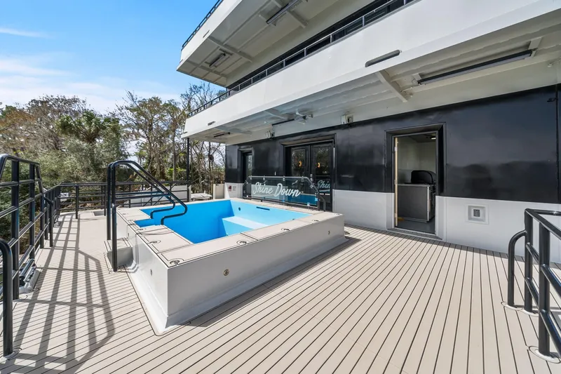 Shine Down Yacht Photos Pics Luxury yacht deck with pool, Breaux Brothers 120 GLV, 2025 model.