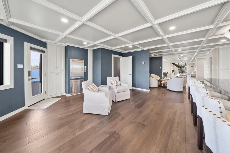 Shine Down Yacht Photos Pics Luxurious interior of 2025 Breaux Brothers 120 GLV yacht with elegant seating and modern design.