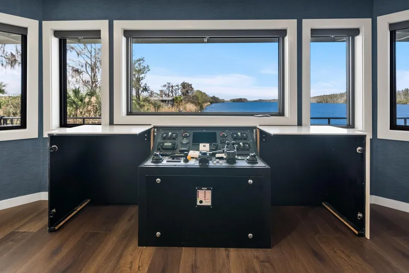 Shine Down Yacht Photos Pics Pilothouse interior of 2025 Breaux Brothers 120 GLV with scenic water view.