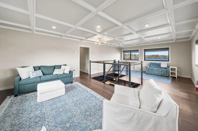 Shine Down Yacht Photos Pics Modern living area on Breaux Brothers 120 GLV yacht, 2025 model, featuring elegant furnishings and scenic views.