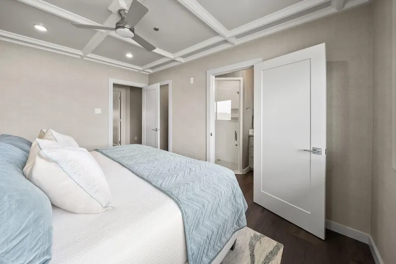 Shine Down Yacht Photos Pics Modern bedroom with coffered ceiling, ceiling fan, and en-suite bathroom, Breaux Brothers 120 GLV 2025.