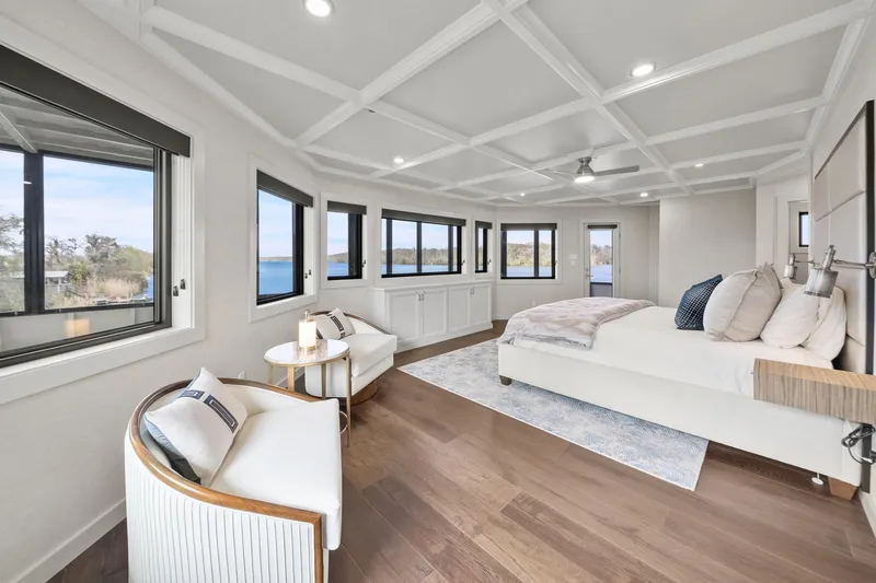 Shine Down Yacht Photos Pics Luxurious bedroom on Breaux Brothers 120 GLV yacht, featuring panoramic windows and elegant furnishings, 2025 model.