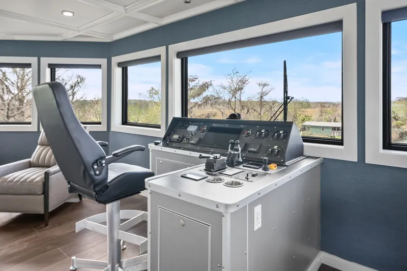 Shine Down Yacht Photos Pics Pilothouse interior of 2025 Breaux Brothers 120 GLV with modern control panel and panoramic windows.
