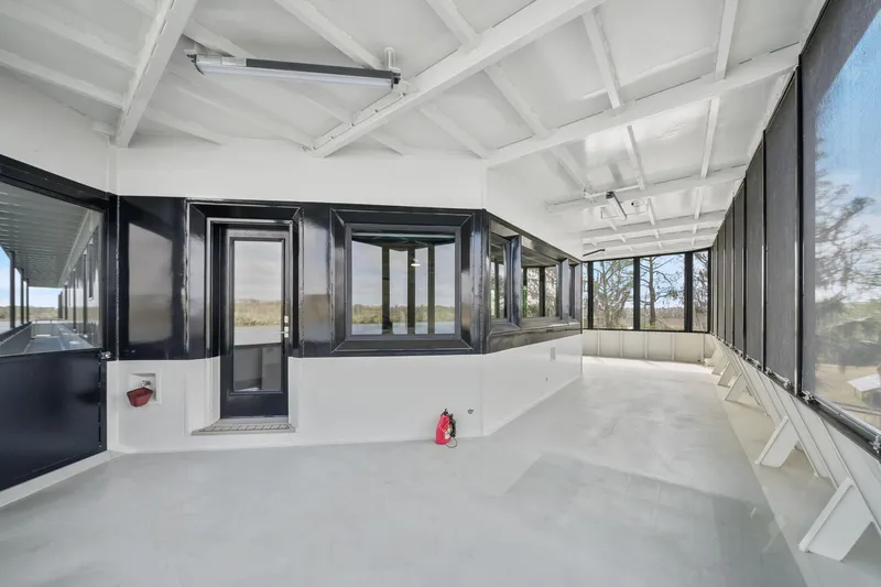 Shine Down Yacht Photos Pics Spacious interior of 2025 Breaux Brothers 120 GLV boat with modern design elements.