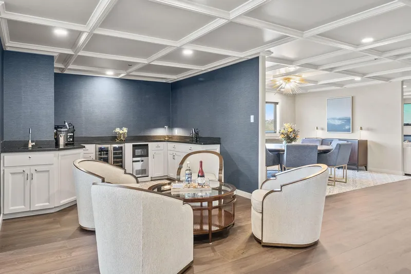 Shine Down Yacht Photos Pics Luxurious yacht interior with elegant seating, modern kitchenette, and stylish dining area, Breaux Brothers 120 GLV.