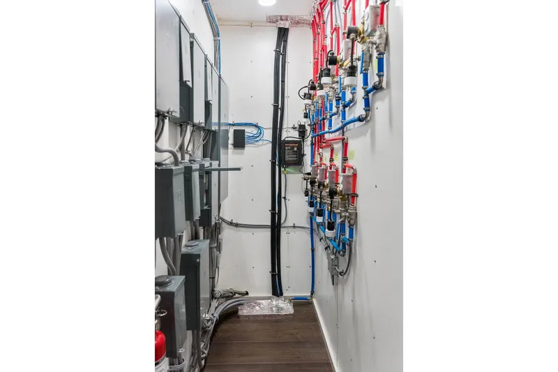 Shine Down Yacht Photos Pics Electrical and plumbing systems inside a 2025 Breaux Brothers 120 GLV vessel.