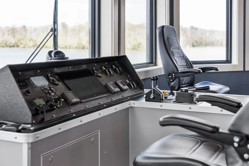 Shine Down Yacht Photos Pics Pilot cabin of 2025 Breaux Brothers 120 GLV with modern control panel and seating.