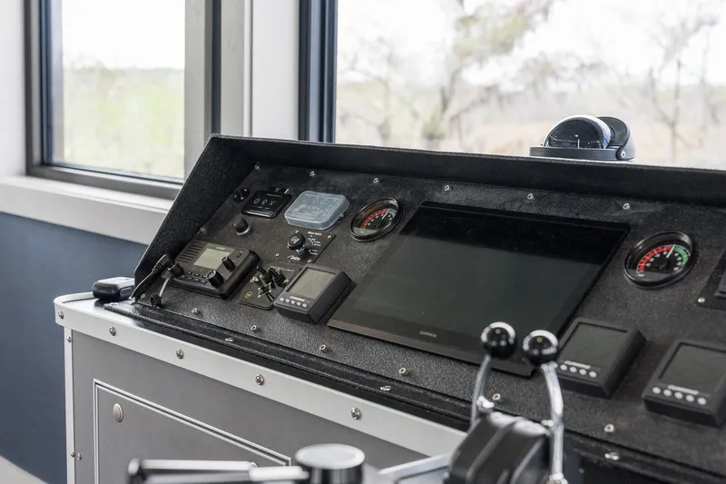 Shine Down Yacht Photos Pics Control panel of 2025 Breaux Brothers 120 GLV boat with modern navigation equipment.