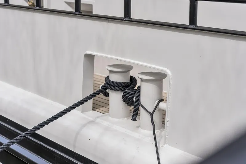 Shine Down Yacht Photos Pics Rope tied to cleats on Breaux Brothers 120 GLV boat, 2025 model.