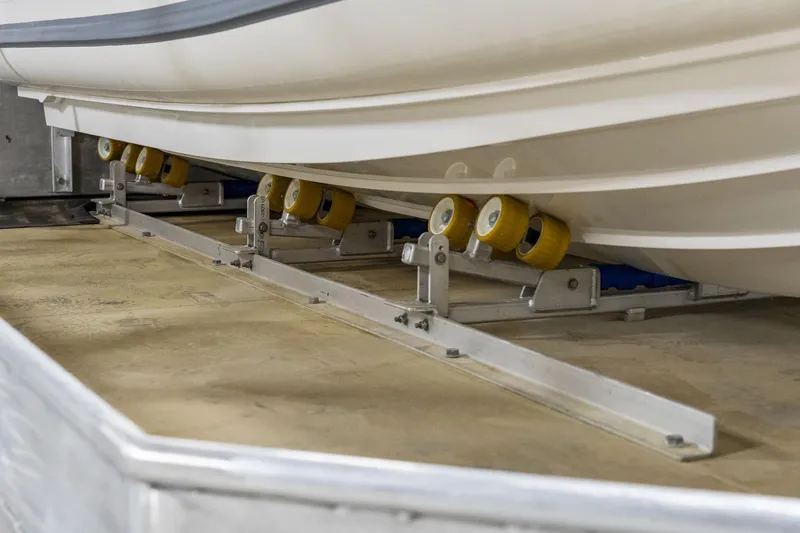 Shine Down Yacht Photos Pics Boat hull on trailer rollers, Breaux Brothers 120 GLV, 2025 model.