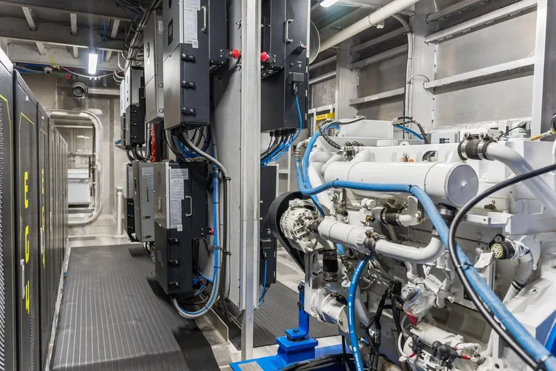 Shine Down Yacht Photos Pics Engine room of 2025 Breaux Brothers 120 GLV vessel, showcasing advanced machinery and equipment.