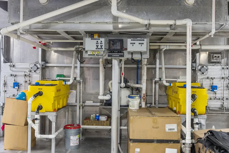 Shine Down Yacht Photos Pics Industrial plumbing system with yellow tanks and control panels, Breaux Brothers 120 GLV, 2025 model.