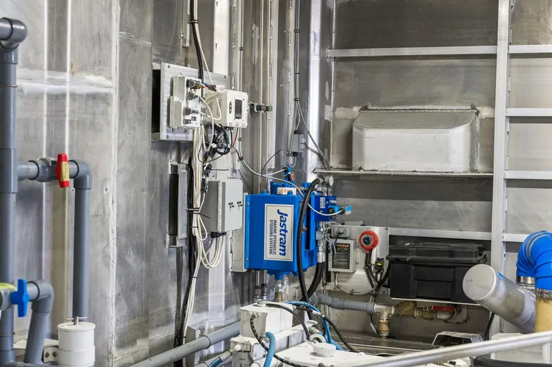 Shine Down Yacht Photos Pics Interior of Breaux Brothers 120 GLV 2025 vessel showing technical equipment and piping.