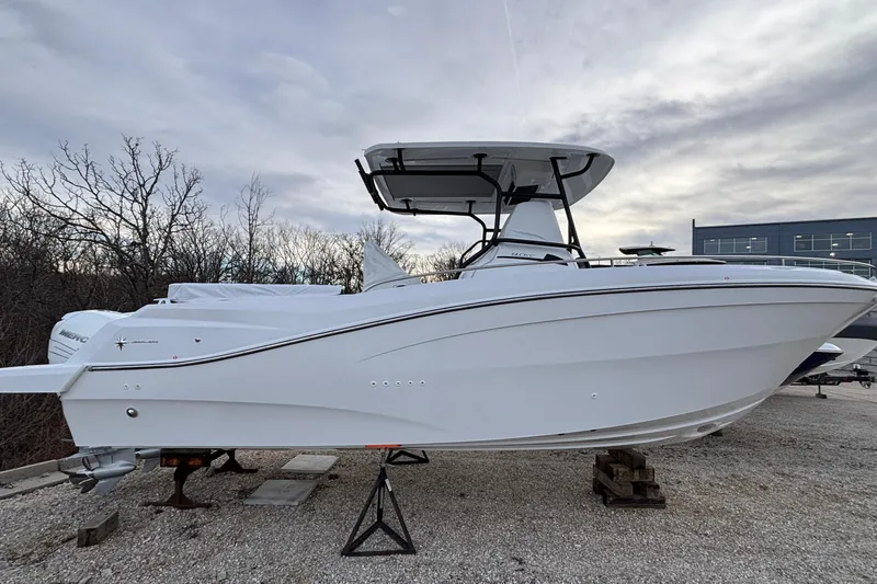  Yacht Photos Pics 2022 Jeanneau Leader 9.0 CC boat on display, side view with overcast sky.
